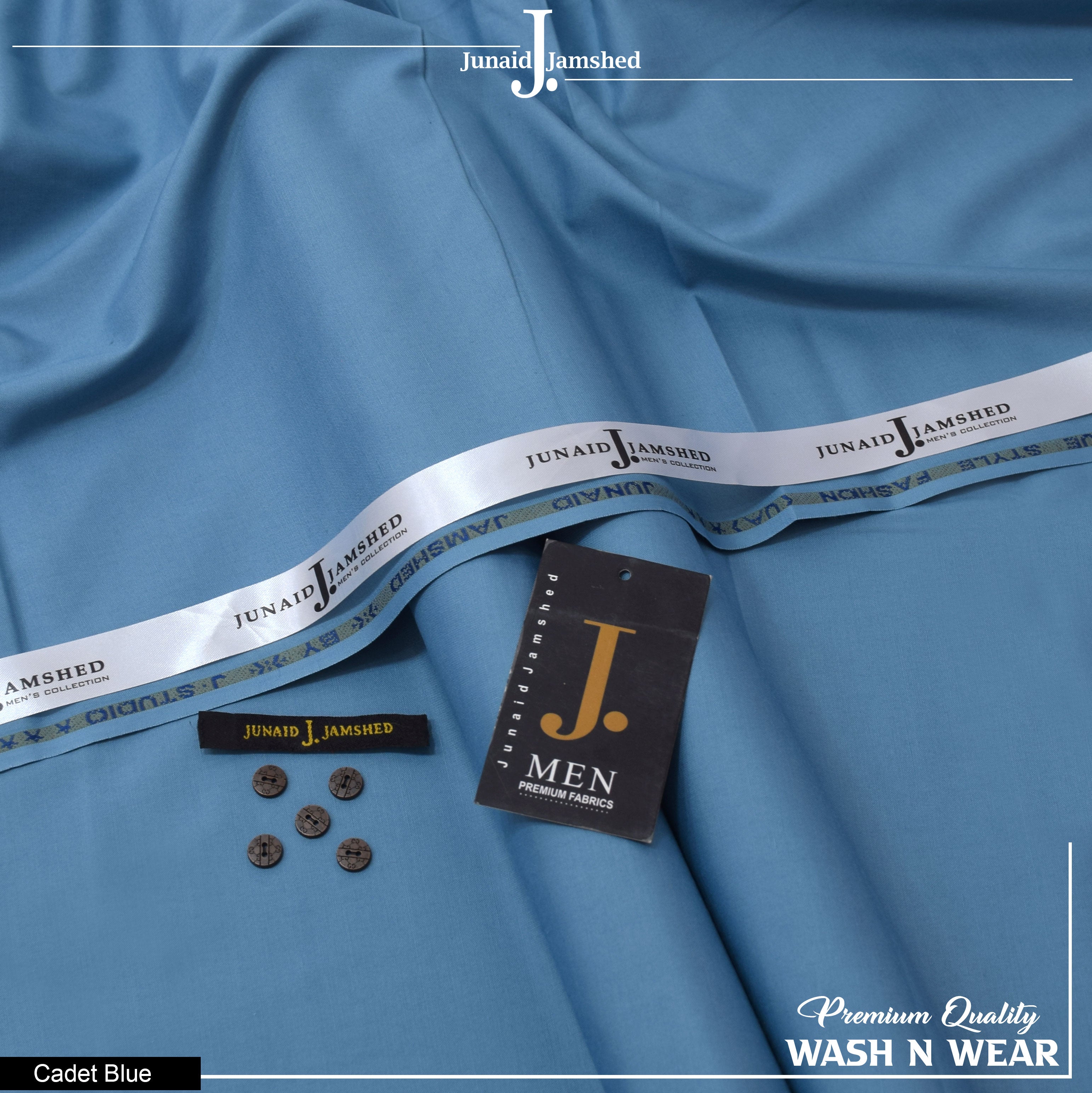 Cadet blue fabric from Junaid Jamshed, shown with its branded white elastic trim, a black hangtag, a small black brand label, and four decorative buttons on a white background.
